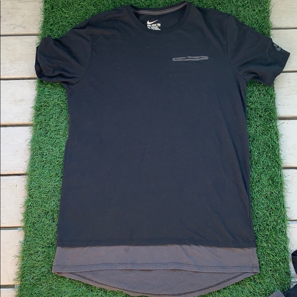 Nike Tech Long Tail short sleeve picket Ts.